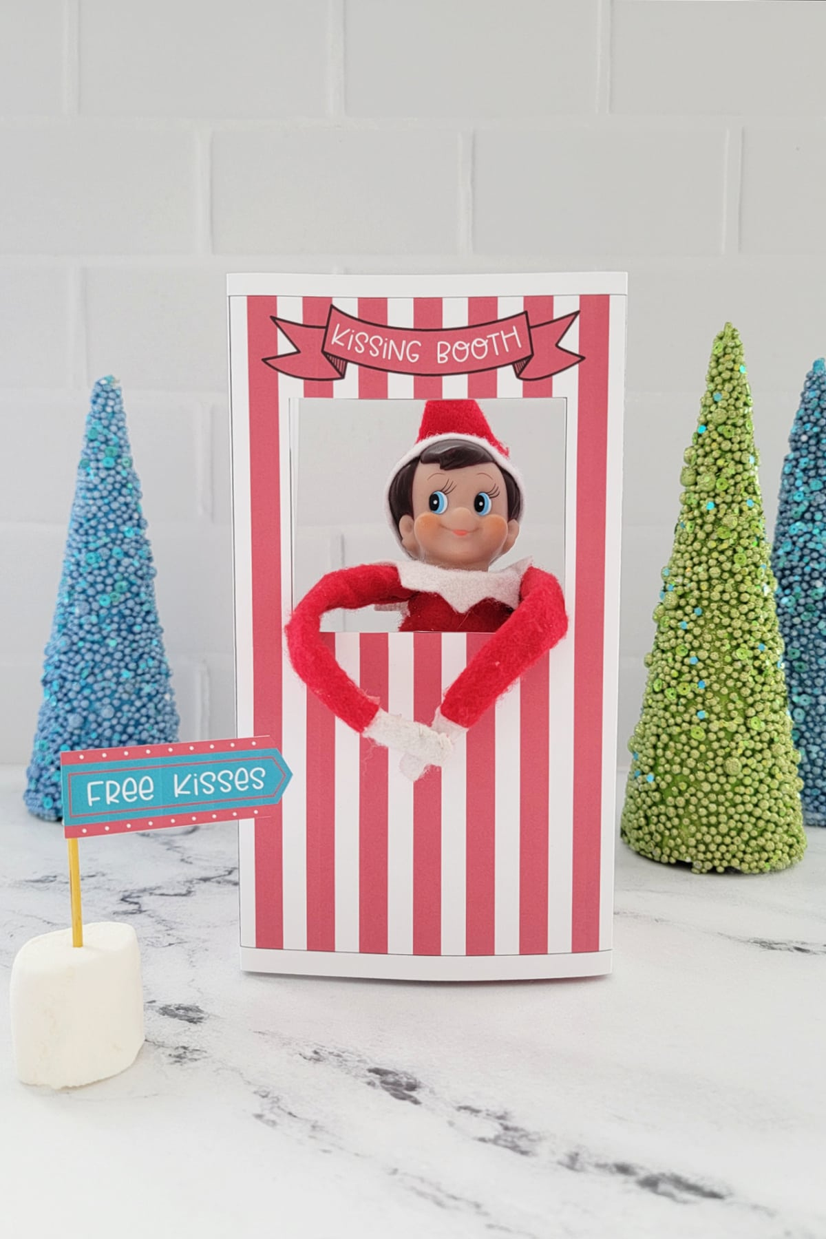 Elf On The Shelf Kissing Booth (Free Printable) - Fun Money Mom with regard to Elf Kissing Booth Free Printable